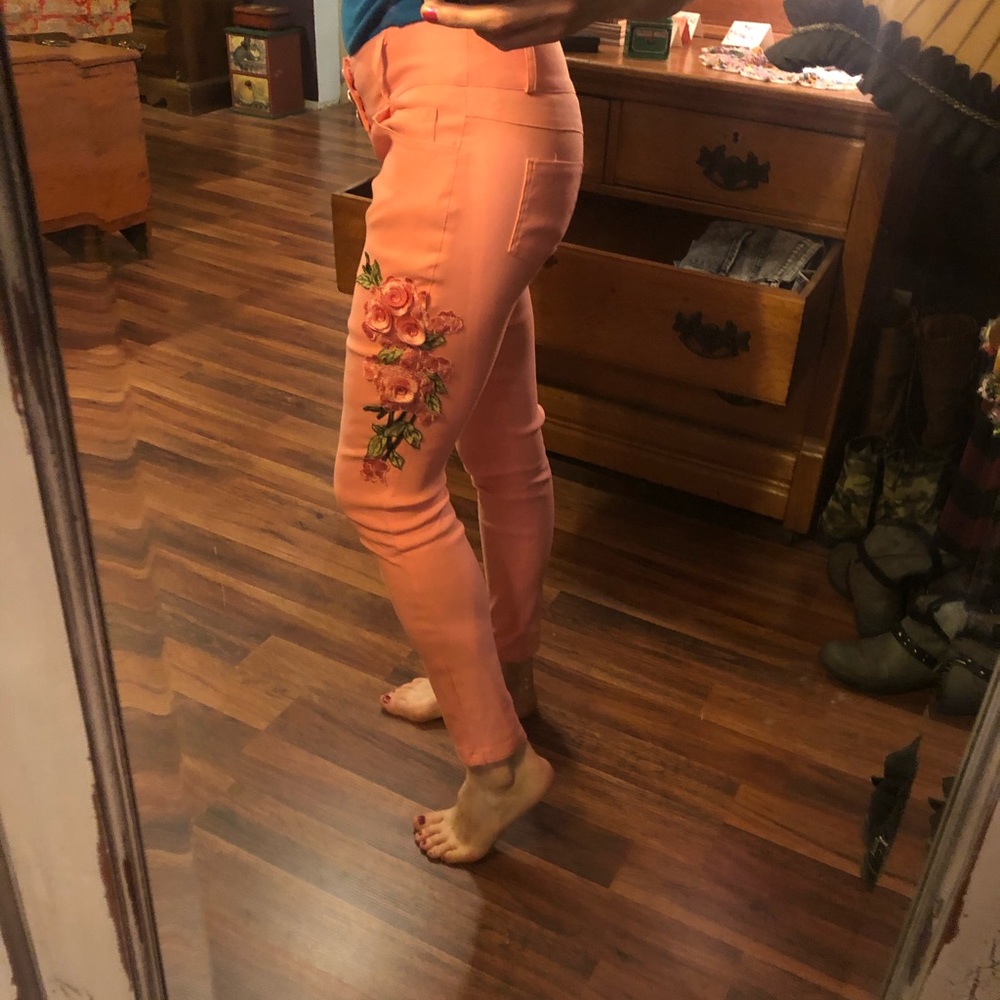 Pink hot pants with embroidered flowers. NWOT